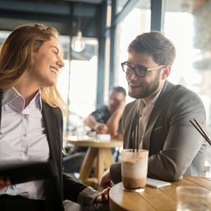 Business people talking and laughing together